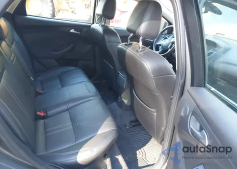 2012 Ford Focus Titanium z USA, uszkodzony, nr VIN 1FAHP3N22CL213454